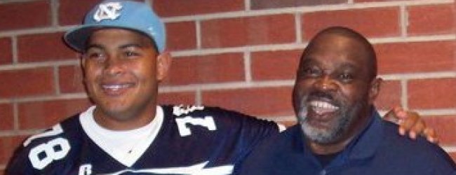 Rising senior Landon Turner poses for a photo next to his father shortly after announcing his decision to attend the University of North Carolina. Photo courtesy of Landon Turner.