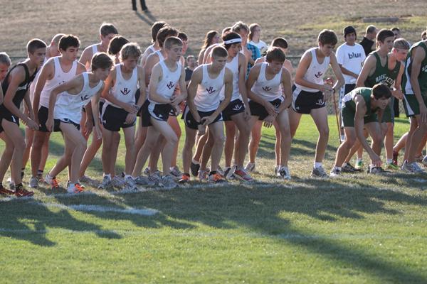 The boys cross country team begins a race on their home course on October 15, 2010. Photo by Aidan Newcity