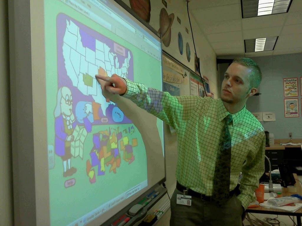ESL teacher Hunter Rush instructs students about the fifty states. He is a first year teacher at Smithland Elementary School. Photo by Kavya Beheraj