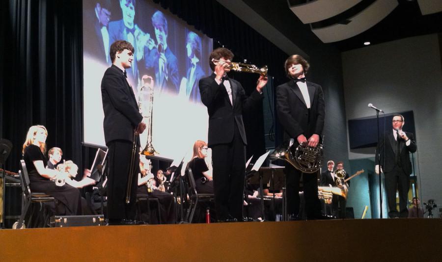 Senior Evan Dotas, Sophomore Patrick Badia, and Junior Douglas Richer show off their instruments.