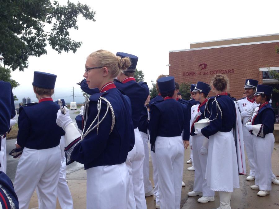 Assistant Drum Major senior Hollyn Slykhuis waits for the truck to be unloaded. 