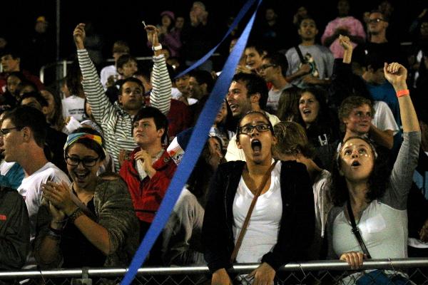 The Red Sea celebrates after a touchdown by the Streaks.