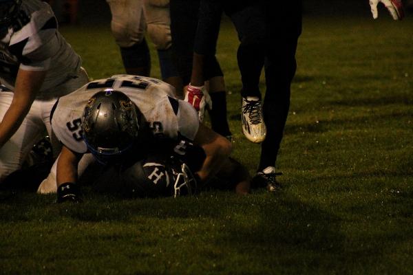Spotswood player tackles HHS player.