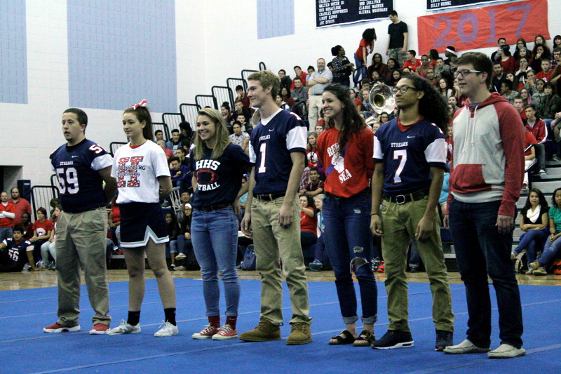 Homecoming Court poses for pictures at the pep rally