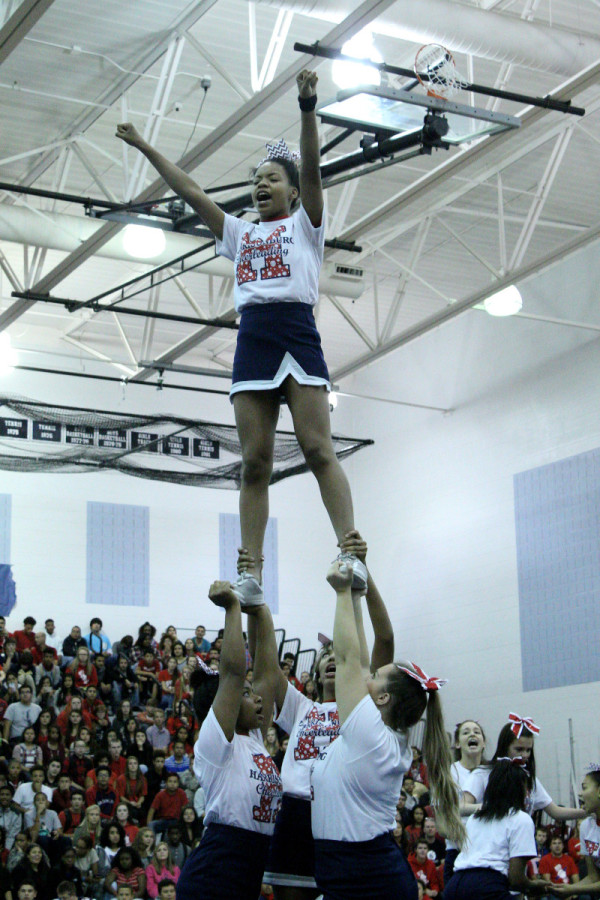 Sideline Cheer celebrates for Homecoming.