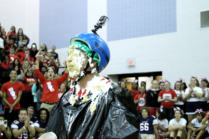 Vice Principal Eric Miller sits in the aftermath of being pied in the face. 