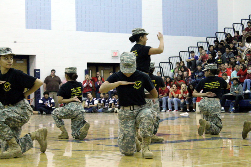 JROTC stepping team performs at the pep rally
