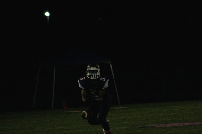 HHS player goes for the ball.