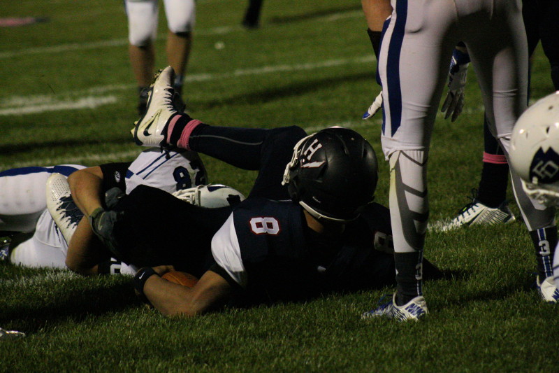 HHS player scores a touchdown for the Streaks.