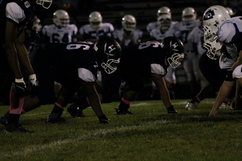 Players wait for the play to begin.