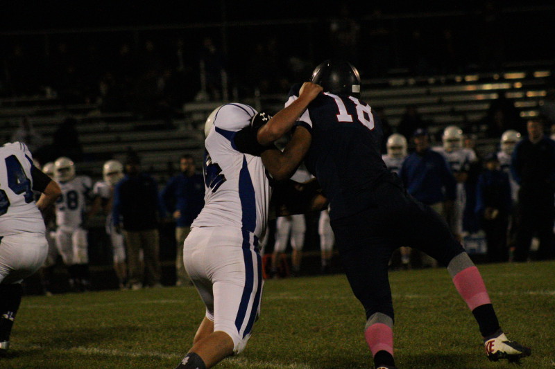 Fort Defiance player attempts to block HHS player