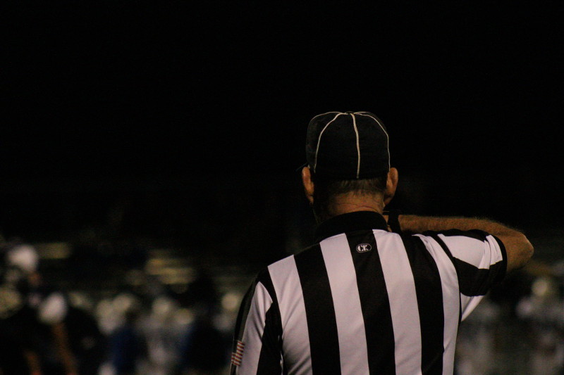 Referee calls a play.