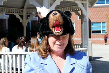 Math teacher Patricia Kelley poses for a photo with her bear themed hat. “I’m wearing a bear hat because I have bears in my yard.” Kelley said. “I live in the mountains so I thought a bear hat would be fun.” 