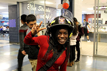 Junior Chenelle Francois wears a firefighter helmet to show her spirit. “ I wear this for fire and rescue.” Francois said. “It’s awesome. It’s also fireproof.”