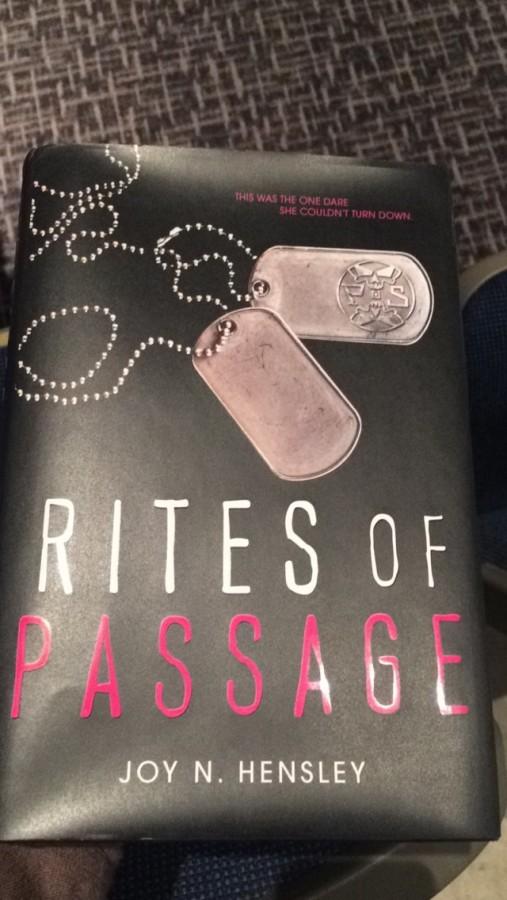 Rites of Passage, written by Joy N. Hensley. I recommend it for people who want a taste of what real life is, Hensley said. You’re going to pick of Rites of Passage and it’s not a happily ever after book; it’s real life. Rites of Passage is available to check out now in our library.
