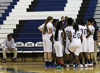 The team huddles before their next play. 