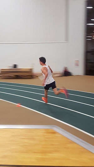 Diego Avila runs his leg in the 4x800m relay.
