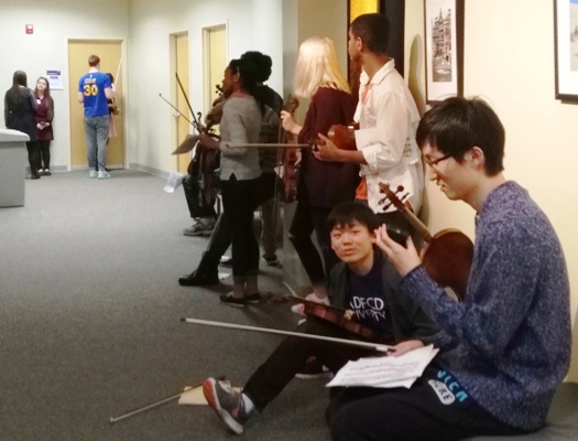 Violinists wait in line for their All State Orchestra audition to begin on February 27th at JMUs Festival Conference and Student Center. Each violinist had to play two scales, their prepared pieces, and sight read a piece of music.