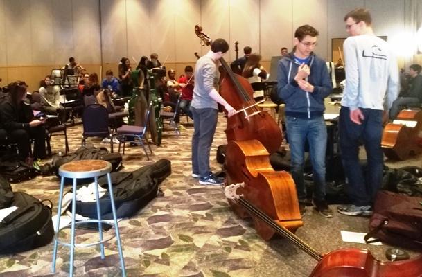 High school cello, viola, and double bass players from all over Virginia practice before their All State Orchestra auditions in their warm up room at JMUs Festival Conference and Student Center on February 27th.