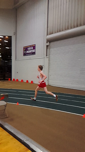 Jacob Blagg paces himself in the mile run.