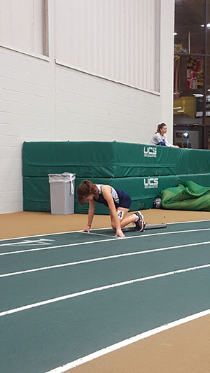 Sara Penrod waits for the gun to start her 300m dash.