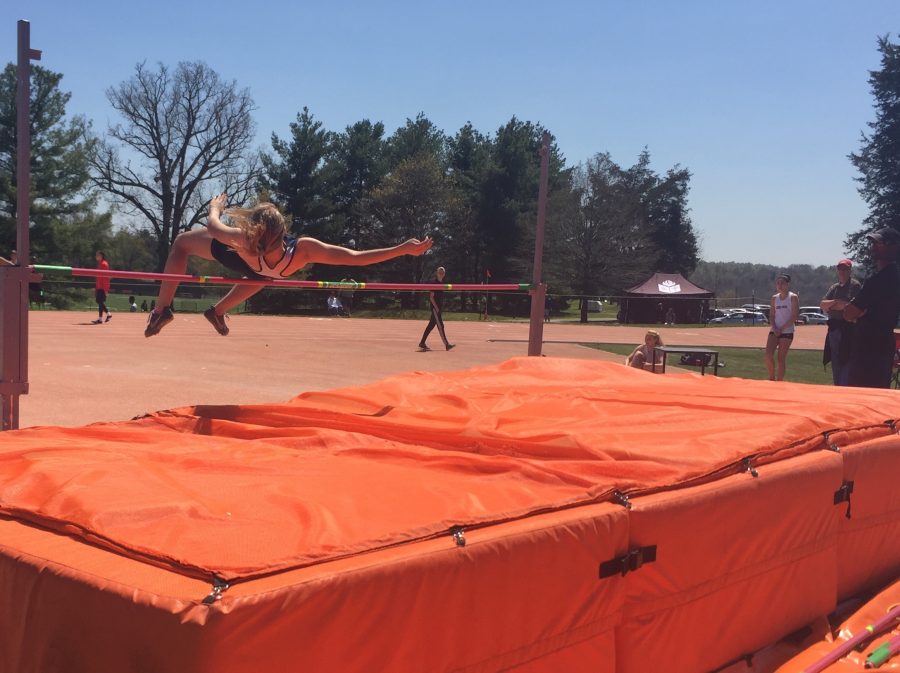 Senior Lexi Eberly participates in the high jump.