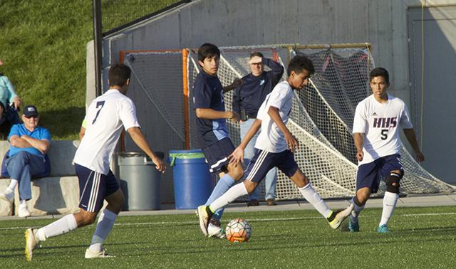 Sophomore Sajjad Imran breaks away from the defender and sets up for a pass to Senior Pepe Gonzalez-Cavazos.