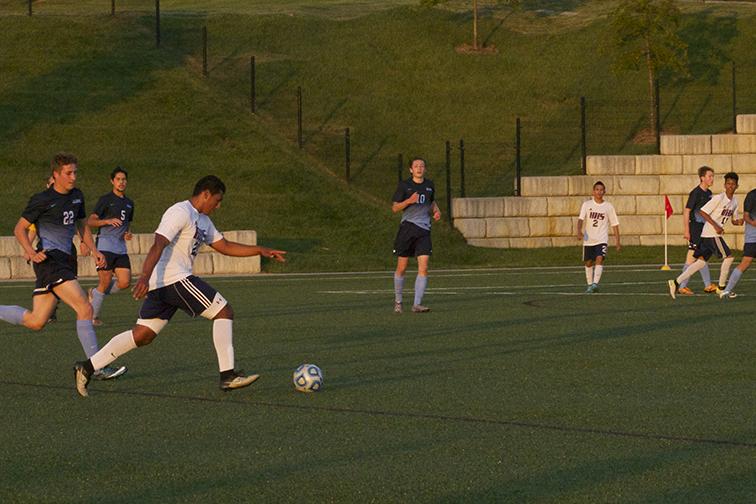 Jaun Perez-Cardoso comes up from defense and fires a shot from midfield that was saved by the Millbrook keeper.