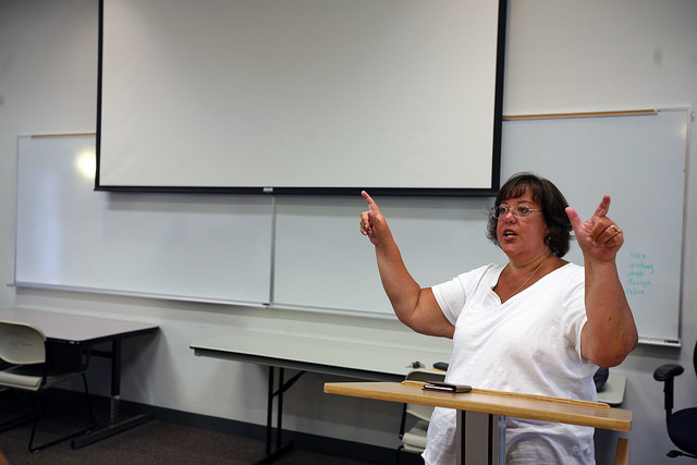 Advisor Valerie Kibler instructs Governor's School  journalism students.