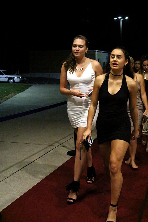 Emma Trevino and Makiah Kindle arrive at the Hollywood themed homecoming.