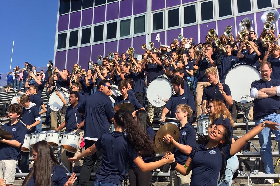 Marching band jams as Harrisonburg leads Broadway.