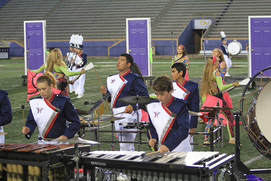 (Front left to right) Senior Mikaela Leach, freshman Jack Hotchkiss, (Back left to right) sophomore Alison Munoz and freshman Juan Martinez make up part of the front ensemble. 