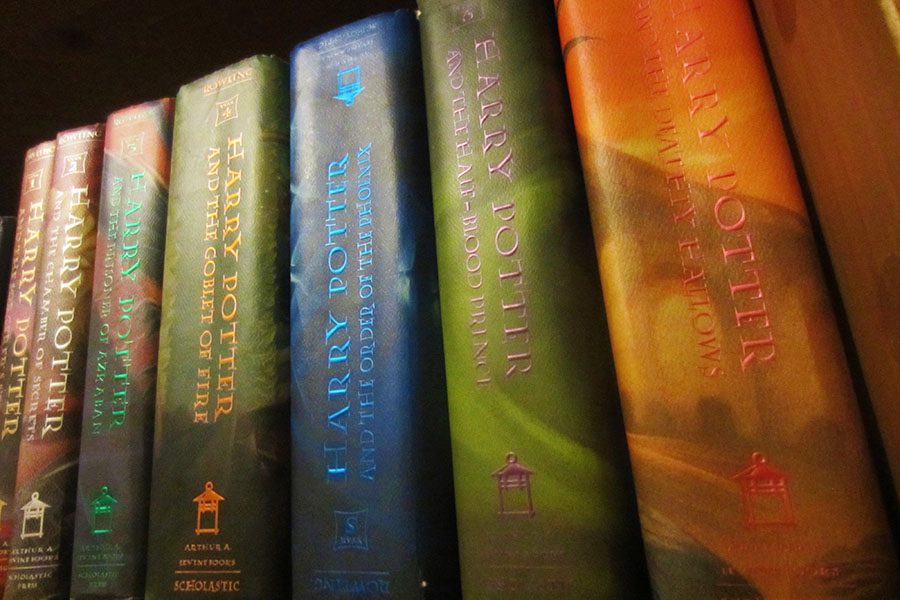 The+Rowling+books+line+up+on+a+bookshelf
