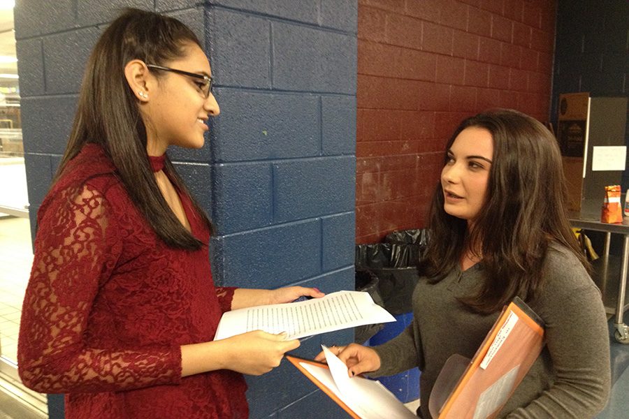 Sophomores Bismah Khan and Elisavet Savides practice debating
