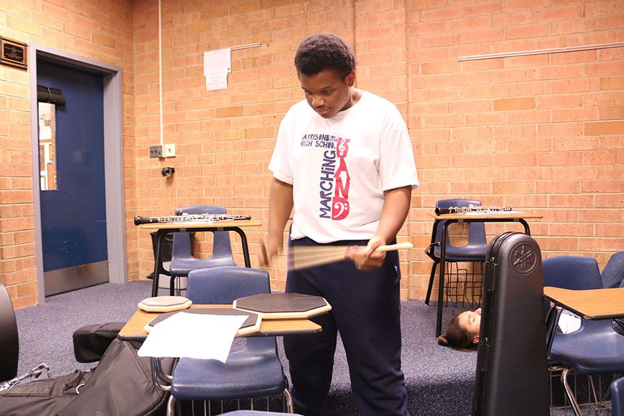Senior Joshua Jordan practices his drum-playind in preparation for when he goes before the judges