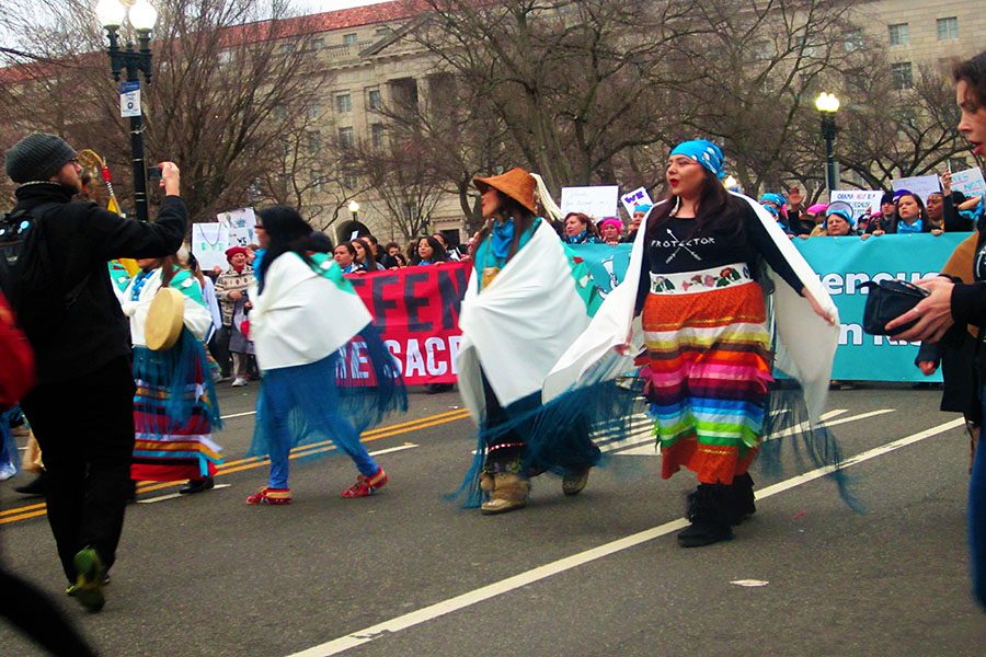 A Native American rights march takes place within the Womens  March