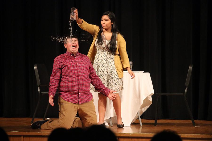 Junior Lizet Muniz character throwing water on Sophomore Nick Gladds character. 