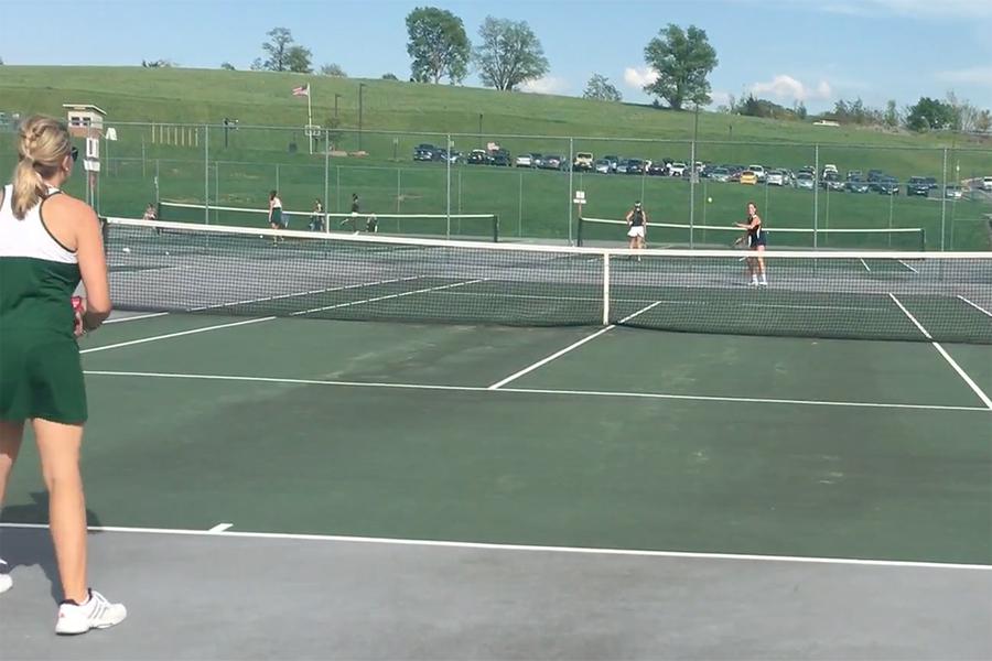 HHS volleys the ball back to Broadway during a singles match