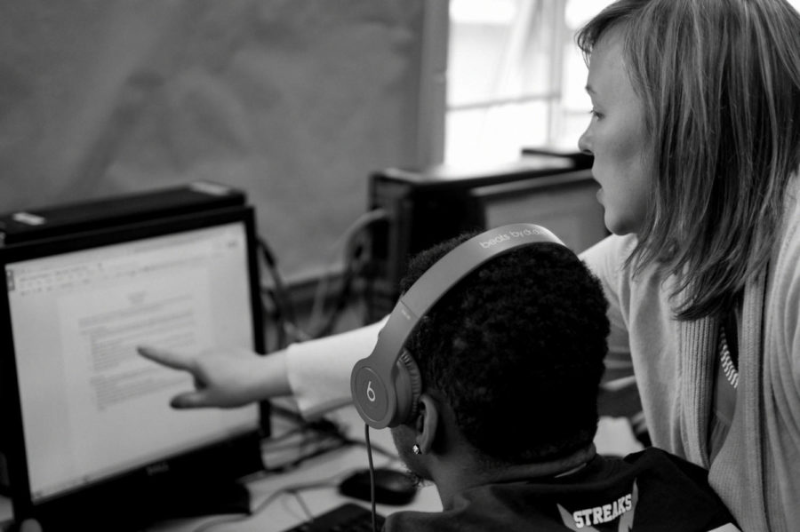 Walton catches Cromer instructing her student on an assignment.