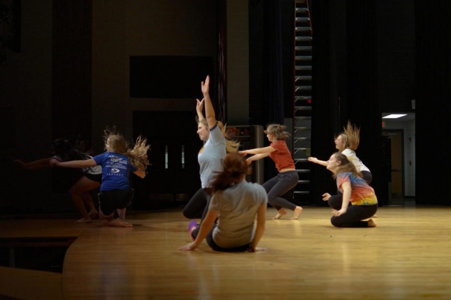 Students perform their piece in dance class.