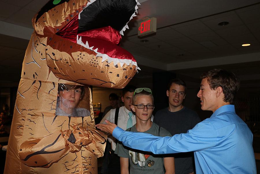 Homecoming outfits were taken to a whole new level by Aerious Kubien, who decided to come in a dinosaur suit.