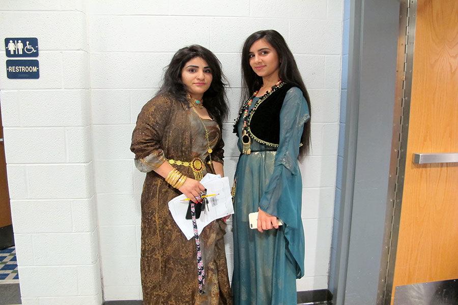 Khadija Sayyid and Bala Abubakr wear traditional Kurdish dresses.