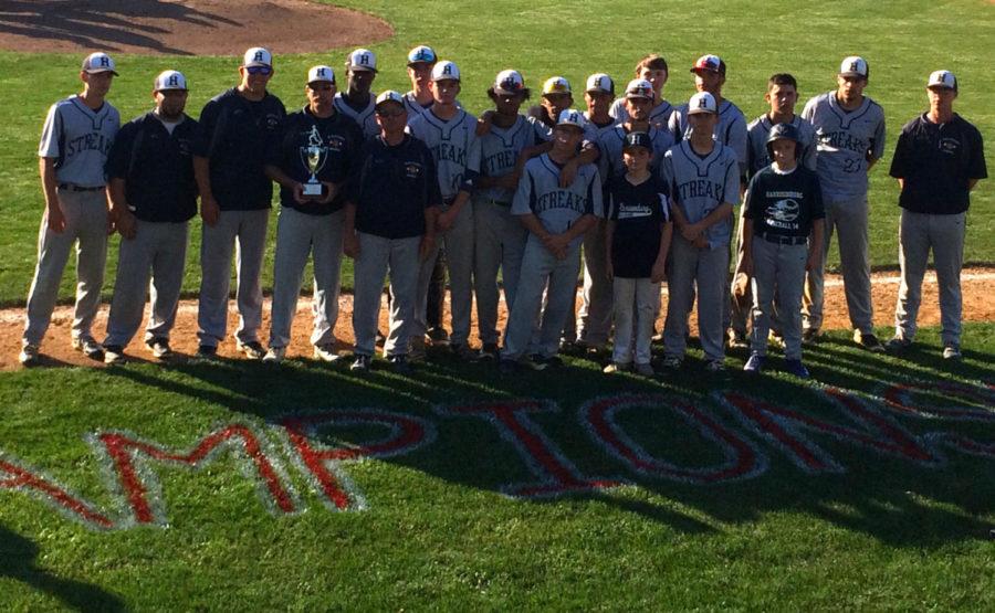 The+Streaks+varsity+baseball+team+holds+their+trophy+after+playing+Liberty+Christian+Academy
