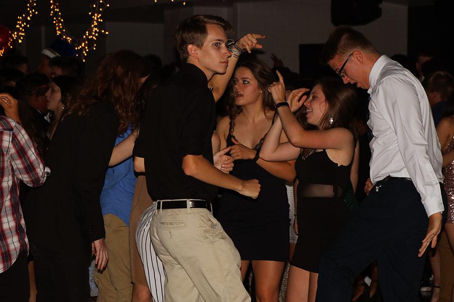 Nick Burzumato dances with his friends.