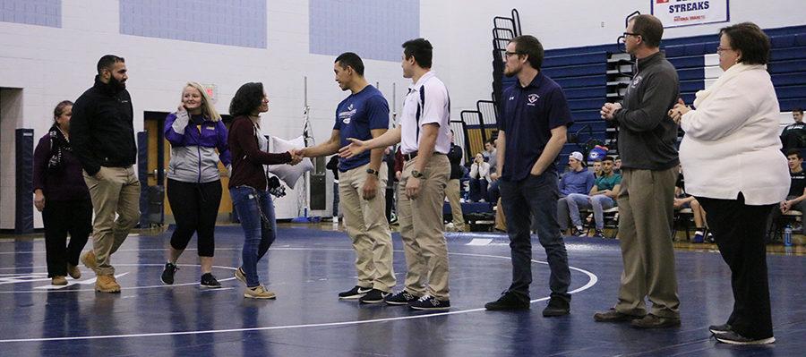 Shenah Kababchy thanks the coaches as she is called during the wrestling senior night.