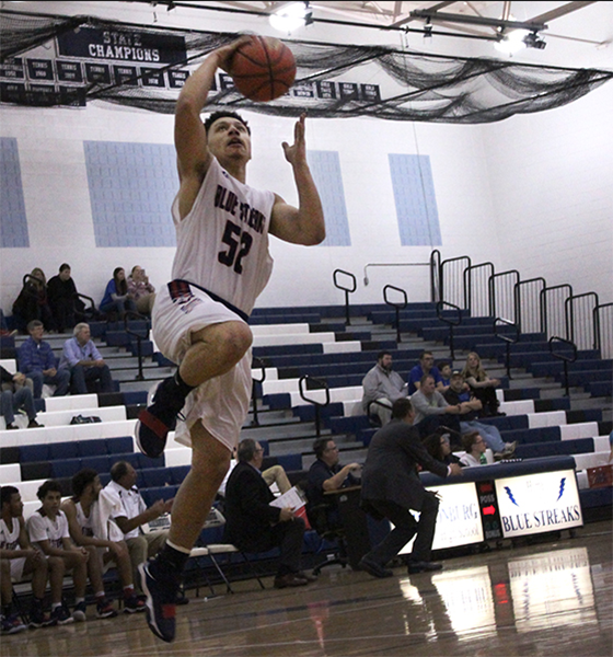 sophomore D’shawn Fields shoots the basketball.