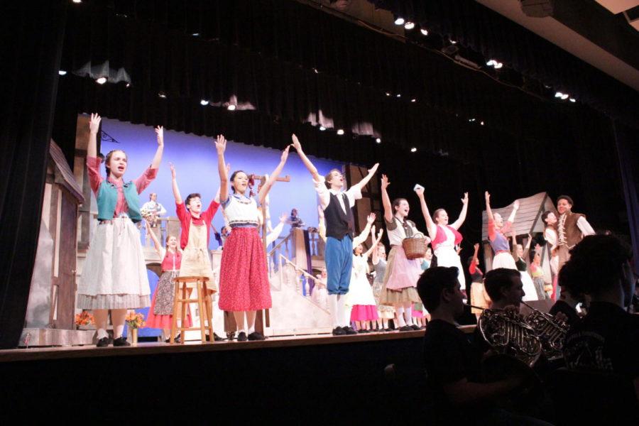The ensemble sings "The Prince Is Having a Ball", where senior Gregg Castillo and freshman Stanley Inouye, playing Herald and Lionel, announce the Prince's 21st birthday ball.