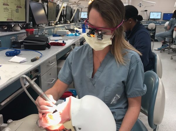 Ali Byrd, class of 2011, works on a dummy at the Medical University of South Carolina.