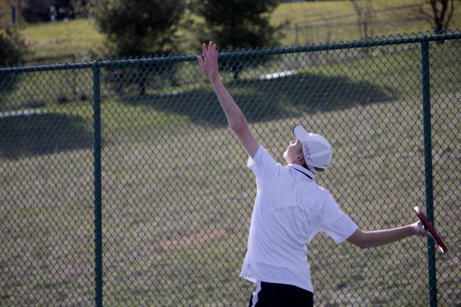 Junior John Collier serves the ball in his match against Rockbridges number two player