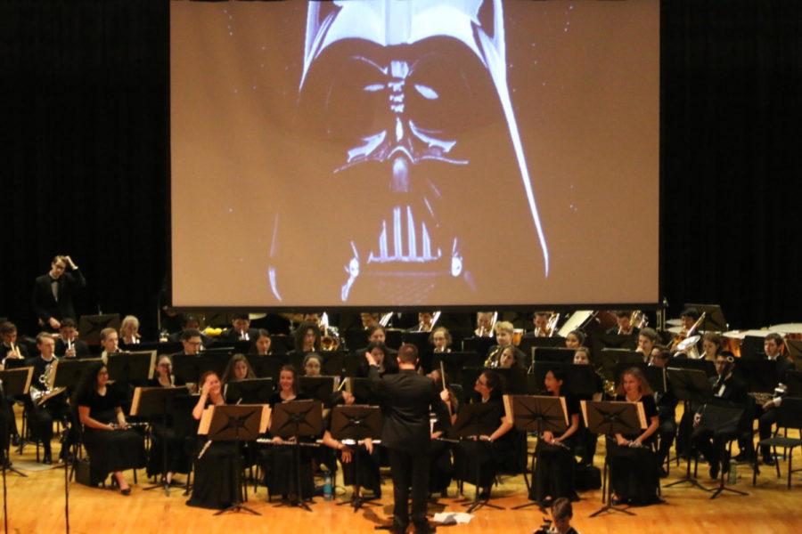 The band plays music from Star Wars, much to the delight of the kids.